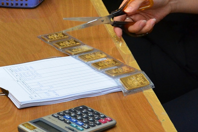 Gi&aacute; v&agrave;ng h&ocirc;m nay 27-12: Bật tăng trở lại - Ảnh 1.