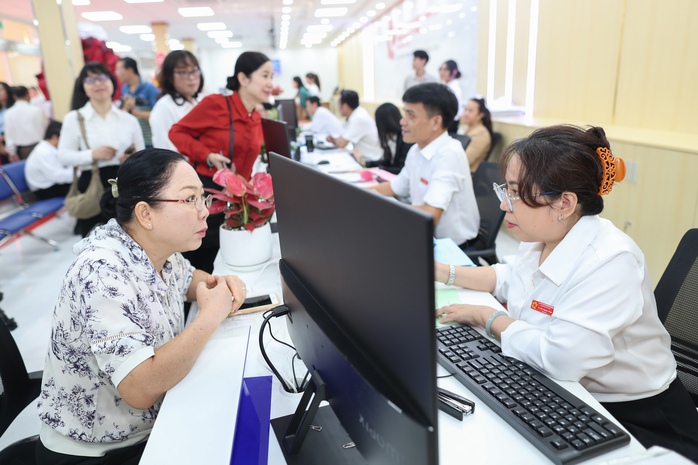 Nỗ lực để phục vụ người d&acirc;n v&agrave; doanh nghiệp tốt hơn - Ảnh 1.