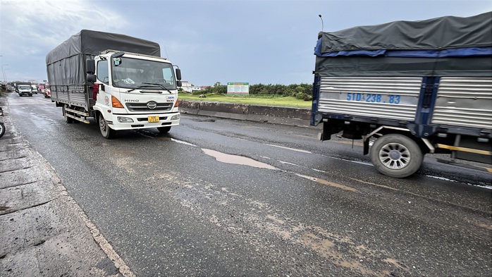 Hình ảnh con đường ‘đau khổ’ Quốc lộ 51 ở Đồng Nai - Ảnh 9.