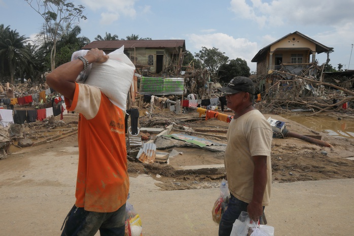 Châu Á chật vật giải quyết hậu quả lũ lụt - Ảnh 1. Châu Á chật vật giải quyết hậu quả lũ lụt - Ảnh 1.