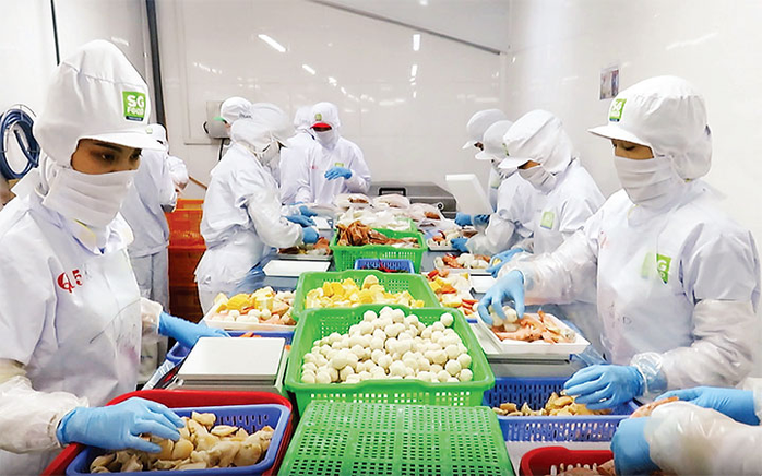 Đề xuất tăng lương tối thiểu vùng năm 2025 vào đầu tháng 3- Ảnh 2. Đề xuất tăng lương tối thiểu vùng năm 2025 vào đầu tháng 3- Ảnh 2.