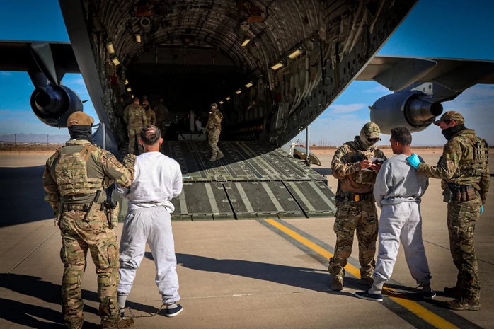 The Department of Homeland Security released photos of migrants as they boarded planes for Guantánamo Bay, Cuba. DHS The Department of Homeland Security released photos of migrants as they boarded planes for Guantánamo Bay, Cuba. DHS