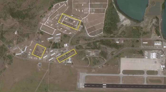 A satellite photo from the commercial company Planet taken on February 4 shows around 140 new tents (yellow boxes) erected near Leeward Point Field at Guantánamo Bay Naval Base. Planet Labs PBC A satellite photo from the commercial company Planet taken on February 4 shows around 140 new tents (yellow boxes) erected near Leeward Point Field at Guantánamo Bay Naval Base. Planet Labs PBC