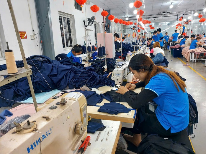 Lương tăng ca cũng bị trừ thuế thu nhập cá nhân? - Ảnh 1.