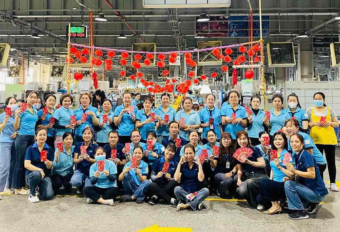 Hai công ty lớn ở Đồng Nai lì xì cho công nhân tổng cộng 15 tỉ đồng - Ảnh 2.