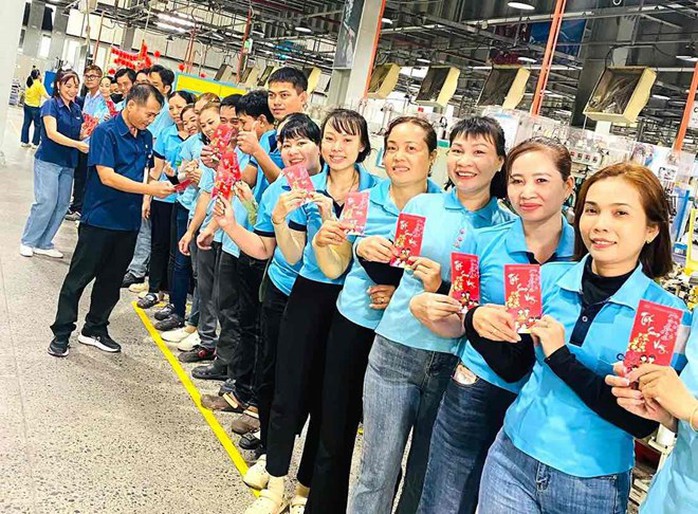 Hai công ty lớn ở Đồng Nai lì xì cho công nhân tổng cộng 15 tỉ đồng - Ảnh 3.