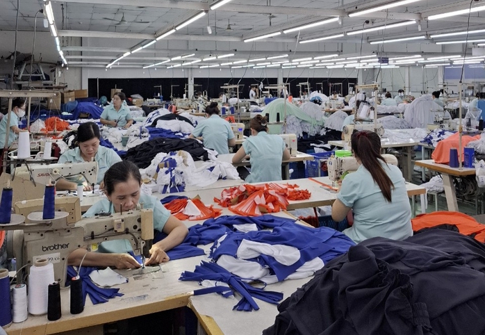 Làm sao để công nhân sống được, doanh nghiệp còn lãi?- Ảnh 1. Làm sao để công nhân sống được, doanh nghiệp còn lãi?- Ảnh 1.