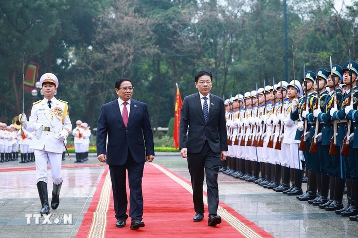 Thủ tướng Phạm Minh Chính chủ trì Lễ đón Thủ tướng Singapore và Phu nhân- Ảnh 1.