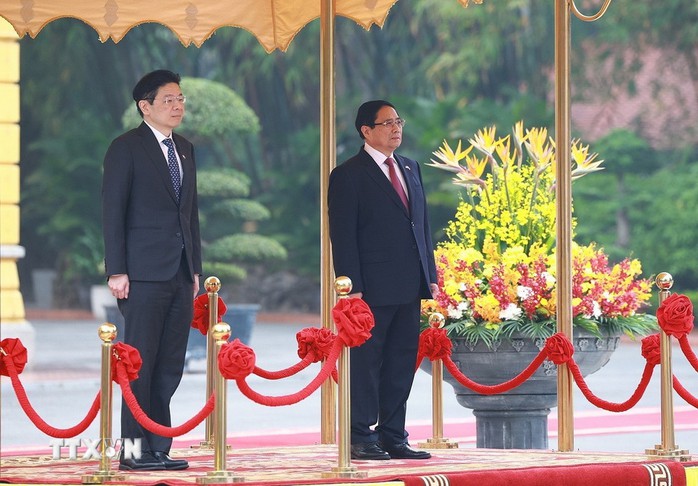 Thủ tướng Phạm Minh Chính chủ trì Lễ đón Thủ tướng Singapore và Phu nhân- Ảnh 8.