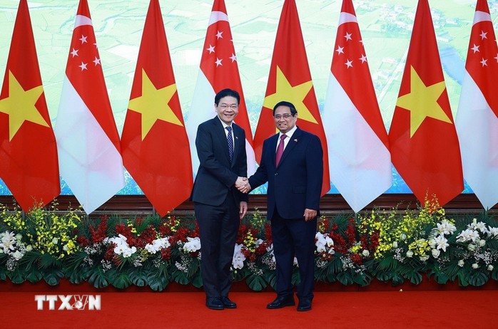 Thủ tướng Phạm Minh Chính hội đàm với Thủ tướng Singapore Lawrence Wong- Ảnh 6.