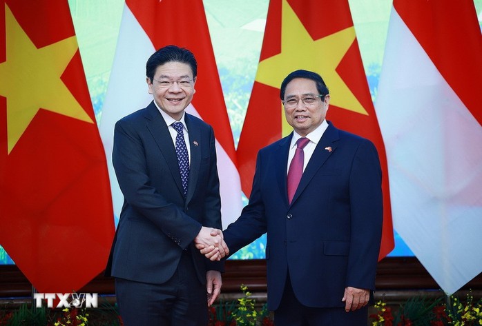 Thủ tướng Phạm Minh Chính hội đàm với Thủ tướng Singapore Lawrence Wong- Ảnh 2.