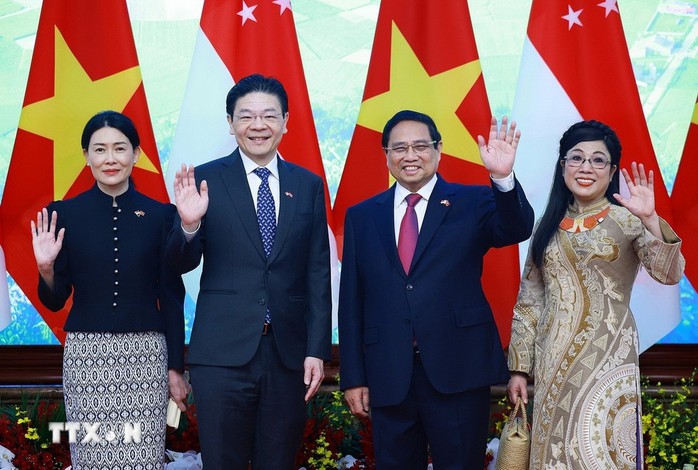 Thủ tướng Phạm Minh Chính hội đàm với Thủ tướng Singapore Lawrence Wong- Ảnh 3.