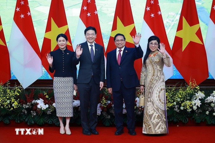 Thủ tướng Phạm Minh Chính hội đàm với Thủ tướng Singapore Lawrence Wong- Ảnh 7.
