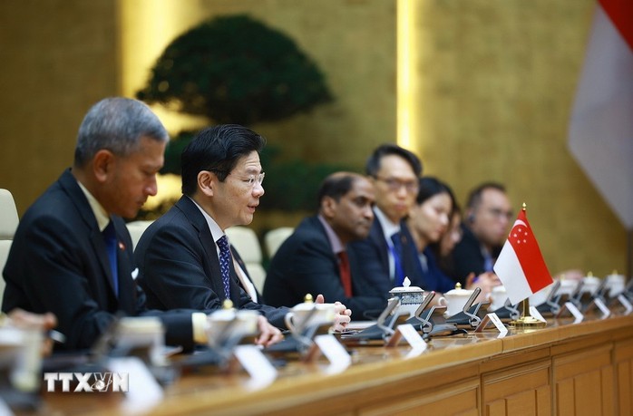 Thủ tướng Phạm Minh Chính hội đàm với Thủ tướng Singapore Lawrence Wong- Ảnh 11.