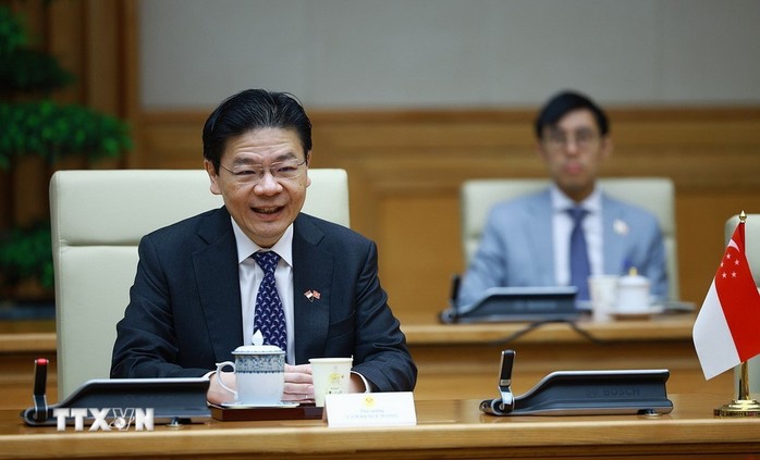 Thủ tướng Phạm Minh Chính hội đàm với Thủ tướng Singapore Lawrence Wong- Ảnh 13.