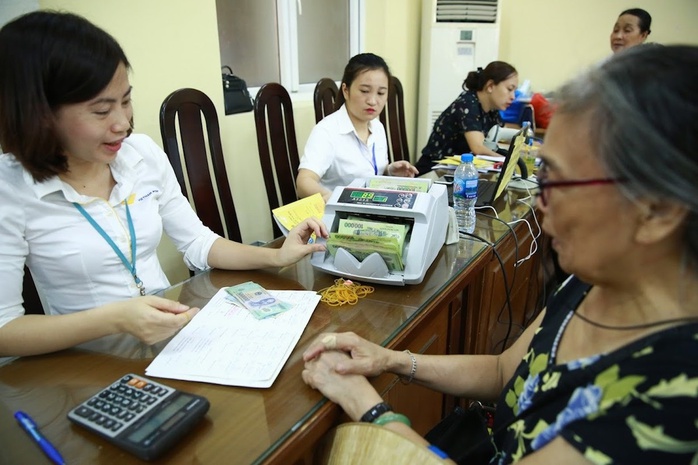 Chi trả lương hưu sau sắp xếp bộ máy được thực hiện thế nào?- Ảnh 1. Chi trả lương hưu sau sắp xếp bộ máy được thực hiện thế nào?- Ảnh 1.