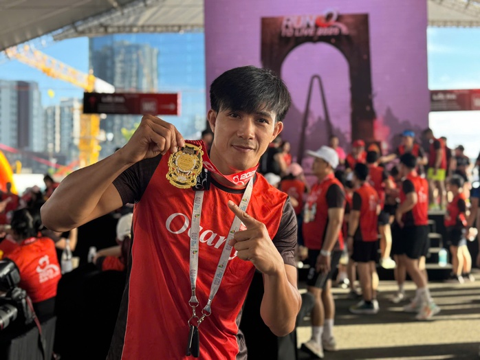 Nguyên Thanh, Hồng Lệ vô địch Giải chạy Run to live 2025- Ảnh 7. Nguyên Thanh, Hồng Lệ vô địch Giải chạy Run to live 2025- Ảnh 7.