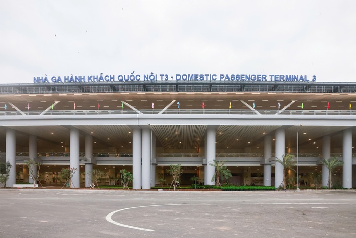 Hành khách bay Hà Nội làm thủ tục tại nhà ga T3 Tân Sơn Nhất- Ảnh 5.