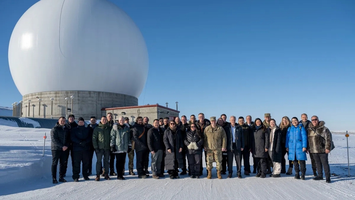 Chief of Space Operations U.S. Space Force Gen. Chance Saltzman and distinguished guests stand in front of a radar dome belonging to the 23rd Space Operations Squadron Detachment 1 at Pituffik Space Base, Greenland on April 5, 2023. Det. 1's mission is to provide telemetry, tracking and commanding operations to the U.S. and allied government satellite programs. (Image credit: U.S. Space Force photo by Senior Airman Kaitlin Castillo)