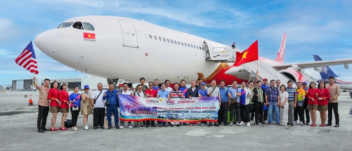 Chuyến bay chở gần 200 doanh nhân Việt Nam sang Mỹ đàm phán đã hạ cánh- Ảnh 1. Chuyến bay chở gần 200 doanh nhân Việt Nam sang Mỹ đàm phán đã hạ cánh- Ảnh 1.