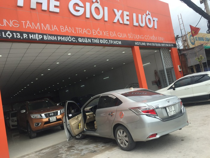 Đại lý ô tô cũ "chê" mua bán trên VNeID - Ảnh 1.