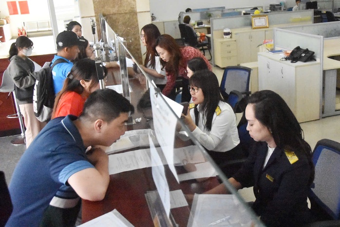Cắt giảm thủ tục hành chính, trợ lực doanh nghiệp - Ảnh 1.