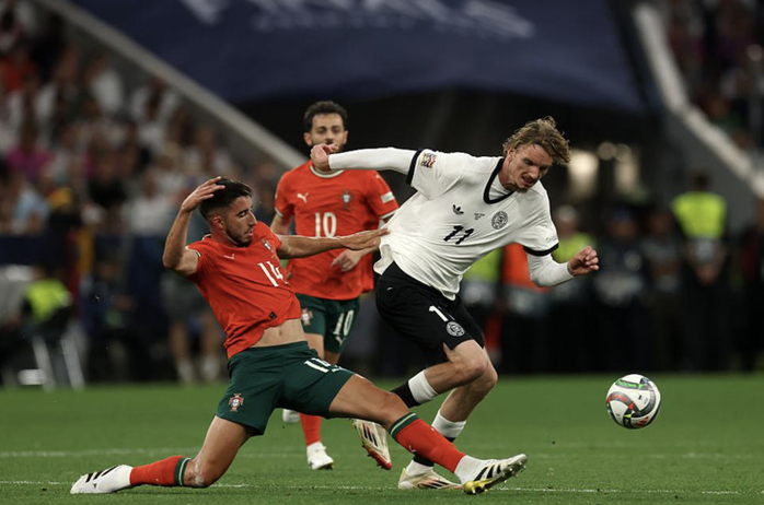 Ronaldo bùng nổ, Bồ Đào Nha loại chủ nhà Đức ở Nations League- Ảnh 1. Ronaldo bùng nổ, Bồ Đào Nha loại chủ nhà Đức ở Nations League- Ảnh 1.