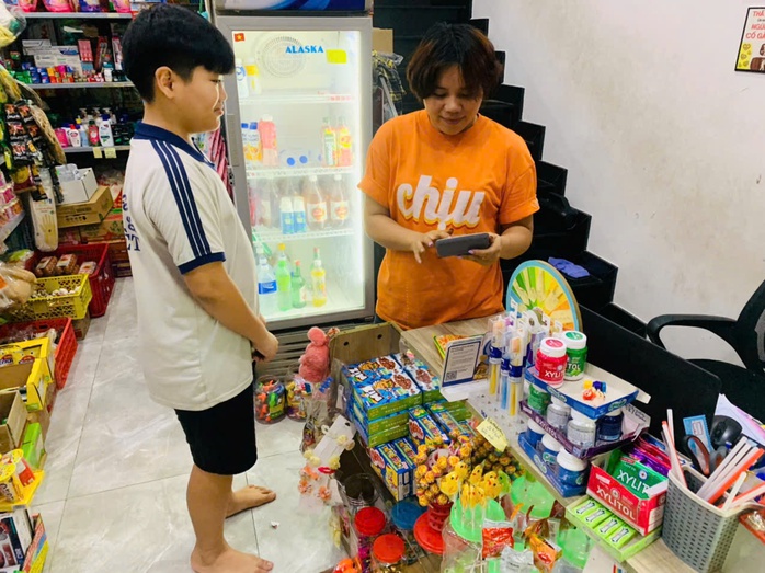 Phải đóng BHXH bắt buộc từ 1-7, chủ quán cà phê, tiệm tạp hóa nói gì? - Ảnh 2.