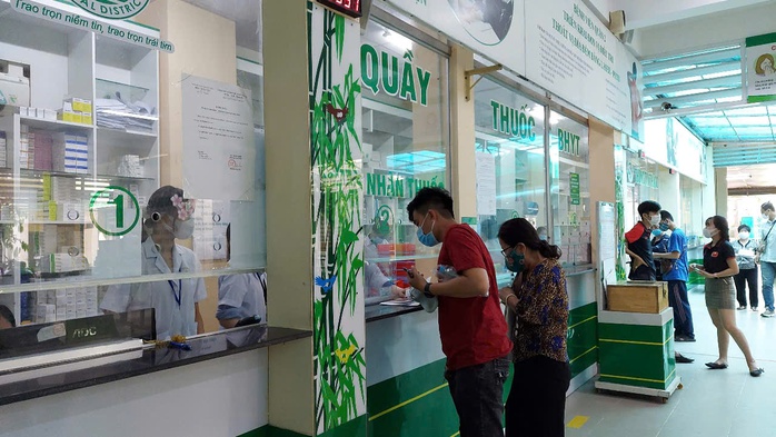 TP HCM bảo đảm quyền lợi BHYT cho người dân từ 2 tỉnh sáp nhập- Ảnh 1.