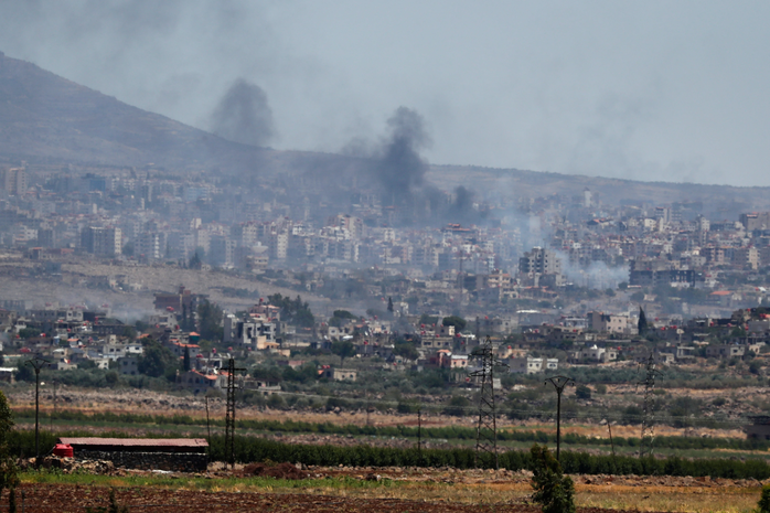 Israel không kích thủ đô Damascus giữa căng thẳng leo thang ở miền Nam Syria - Ảnh 1. Israel không kích thủ đô Damascus giữa căng thẳng leo thang ở miền Nam Syria - Ảnh 1.