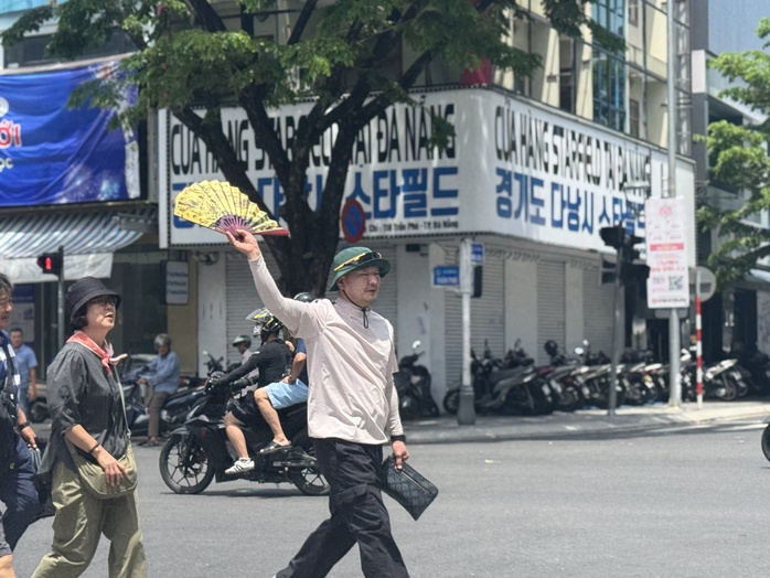 Quản lý thị trường Đà Nẵng triệt phá ổ bán hàng giả dưới vỏ bọc du lịch - Ảnh 2. Quản lý thị trường Đà Nẵng triệt phá ổ bán hàng giả dưới vỏ bọc du lịch - Ảnh 2.