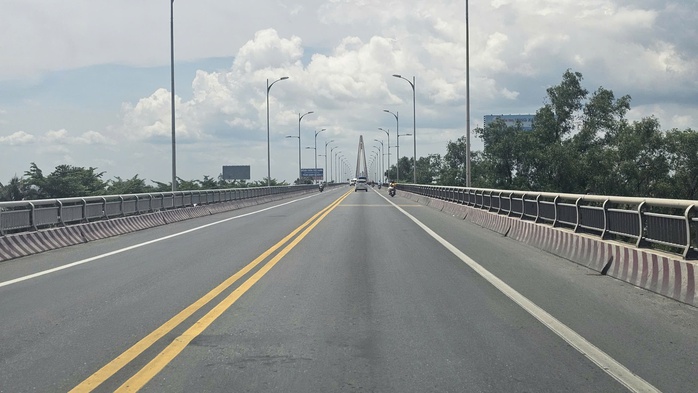 Lượng phương tiện qua cầu Rạch Miễu 2 tăng mạnh sau khi thông xe - Ảnh 6.