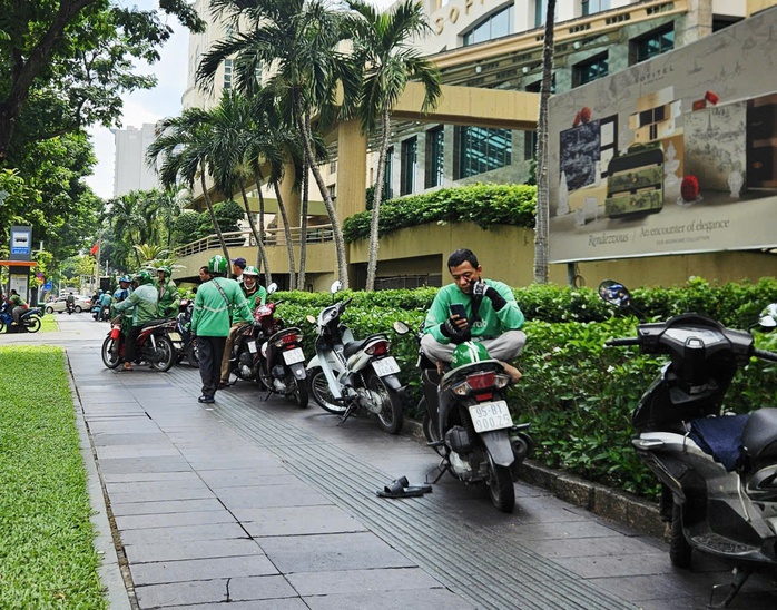Grab Việt Nam đề xuất hệ thống trạm sạc, đổi pin dùng chung giữa các hãng xe điện- Ảnh 3. Grab Việt Nam đề xuất hệ thống trạm sạc, đổi pin dùng chung giữa các hãng xe điện- Ảnh 3.