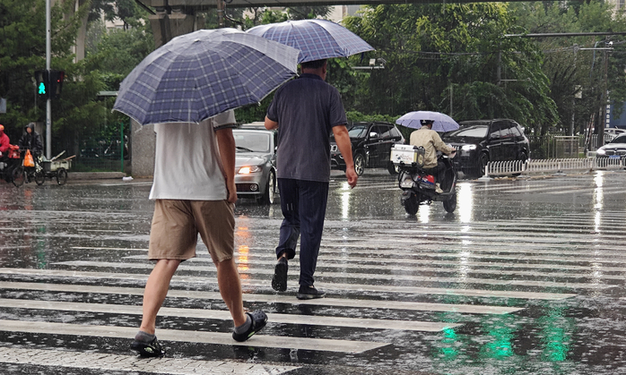 Thủ đô Trung Quốc đặt trong tình trạng báo động vì mưa lũ - Ảnh 1.