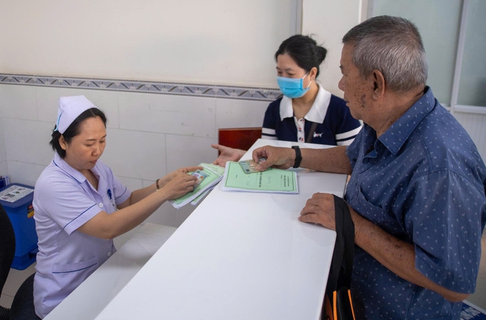 Bảo đảm quyền lợi BHYT sau sắp xếp - Ảnh 1.