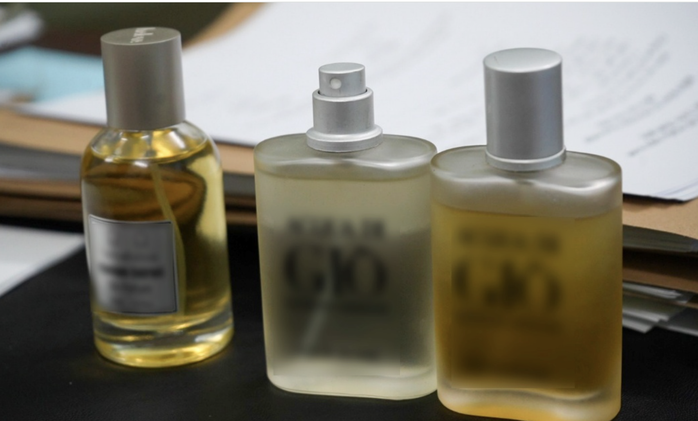 Gi&aacute;m đốc C&ocirc;ng ty HALOVA sản xuất nước hoa giả bị bắt giữ tại TPHCM - Ảnh 4.