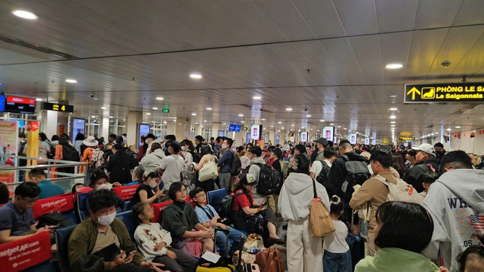 S&acirc;n bay T&acirc;n Sơn Nhất đ&oacute;n 164 . 000 Kh&aacute;ch Ng&agrave;y 26 th&aacute;ng Chạp kỷ lục 2026 - Ảnh 2.