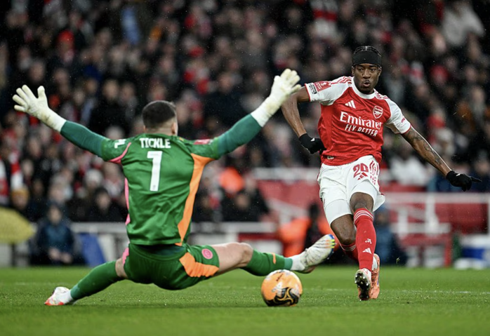 Arsenal thắng nh&agrave;n Wigan, lần đầu v&agrave;o v&ograve;ng 5 FA Cup sau năm năm - Ảnh 1.