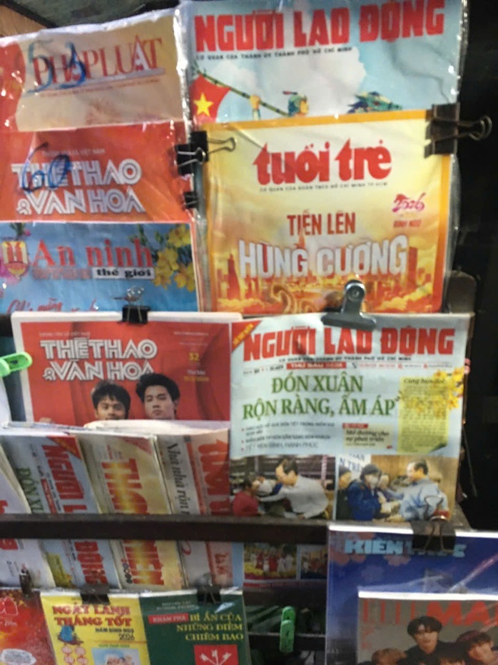 Ng&agrave;y Tết đọc b&aacute;o Xu&acirc;n  - Ảnh 3.