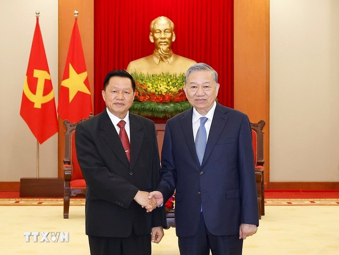 Tổng B&iacute; thư T&ocirc; L&acirc;m tiếp Bộ trưởng Bộ C&ocirc;ng an L&agrave;o - Ảnh 1.