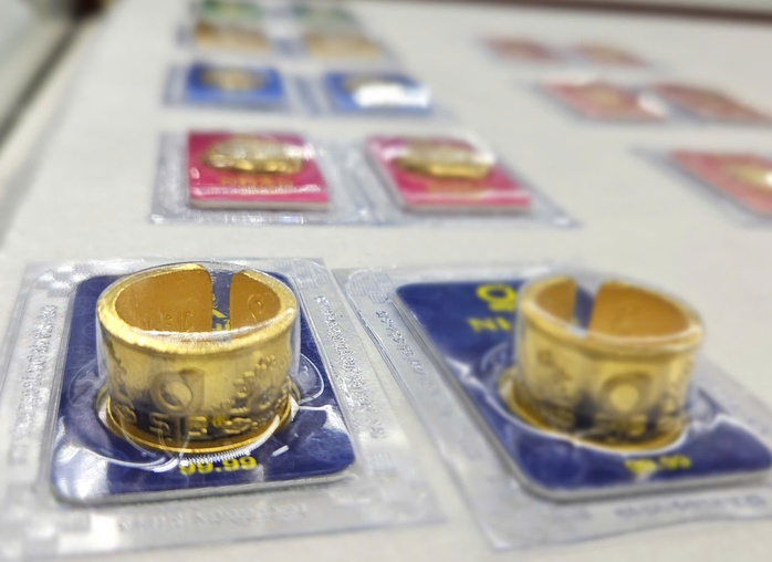 Giá vàng miếng SJC tăng 4 triệu đồng Cuối ngày 23 - 3 , xu hướng kinh tế hiện tại - Ảnh 2.