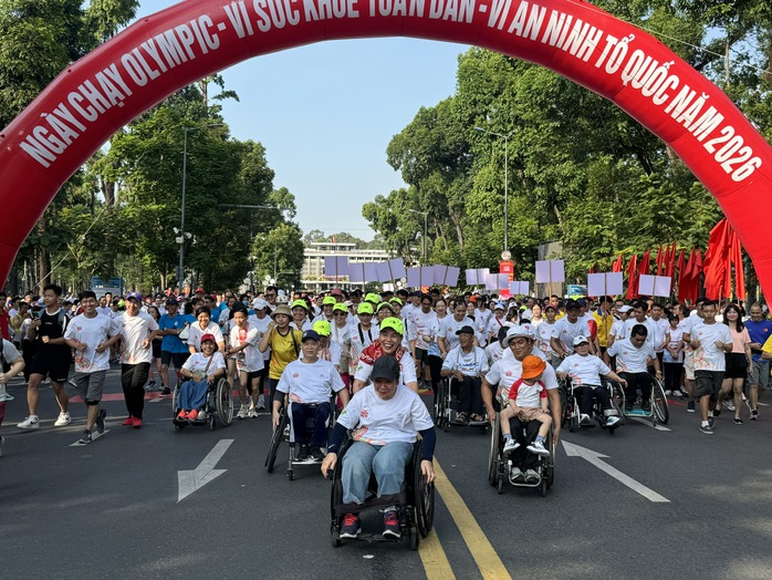 Sôi động Ngày chạy Olympic "Vì sức khỏe toàn dân - Vì an ninh Tổ quốc" tại TP HCM - Ảnh 9.