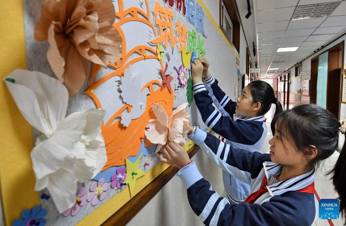 Trung Quốc nỗ lực giảm tải cho học sinh - Ảnh 1.