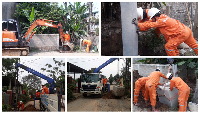 Dưới nắng gắt, c&ocirc;ng nh&acirc;n điện lực thay từng cột điện cũ ở Quảng Trị - Ảnh 1.