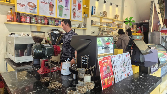 Xanh h&oacute;a chuỗi c&agrave; ph&ecirc; nhượng quyền - Ảnh 1.