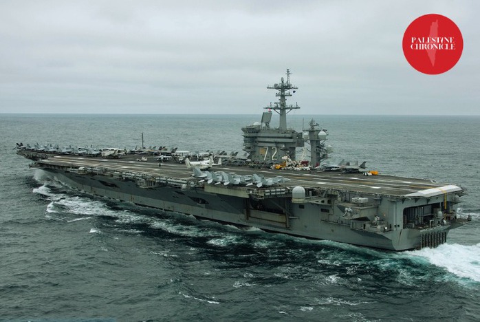 Iran n&oacute;i đ&aacute;nh tr&uacute;ng t&agrave;u s&acirc;n bay Mỹ, b&aacute;c tin đ&oacute;ng eo biển Hormuz - Ảnh 1.