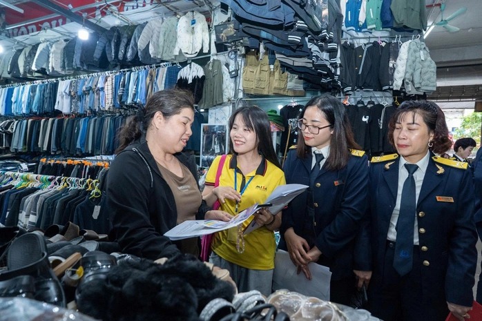 Cải cách thuế cần một "khoảng đệm" cho người dân - Ảnh 1.