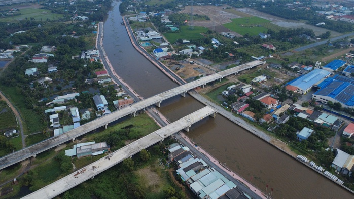 Dự &aacute;n đường ĐT830E 2026 vẫn vướng mặt bằng hơn 50 hộ chưa di dời - Ảnh 1.