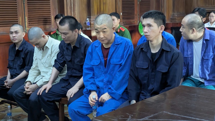 Nh&oacute;m người Trung Quốc cưỡng đoạt tiền điện tử ở TPHCM - Ảnh 1.