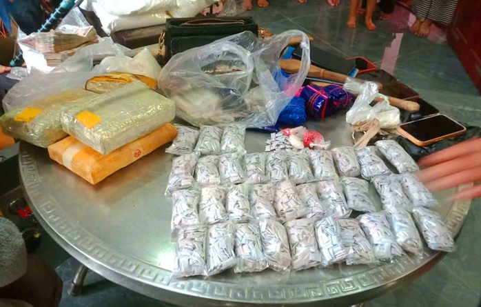 Phá đường dây ma túy xuyên quốc gia, thu giữ 23 kg ma túy cùng 1 khẩu súng - Ảnh 1.